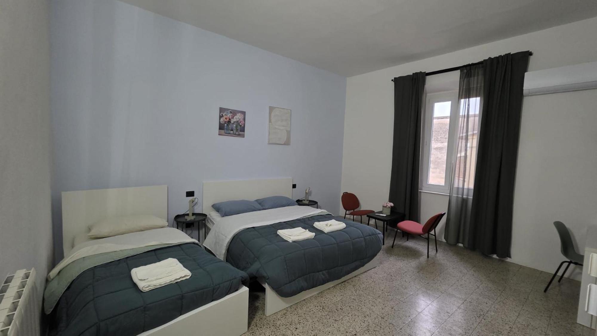 Chambre Triple Basique avec Salle de Bains Commune